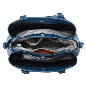 Top-down view of a navy pebble leather handbag showing its organized internal compartments