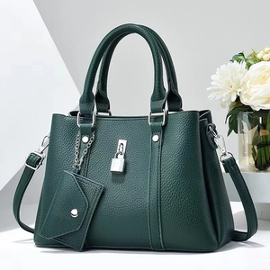 Dark green lychee pattern tote bag with silver padlock and detachable shoulder strap