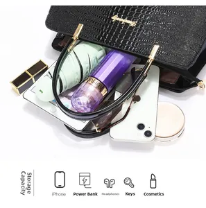 Top view of large black crocodile pattern handbag showing spacious interior storage