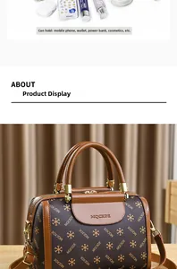 Detailed view of spacious Boston bag interior holding phone, wallet, and cosmetics