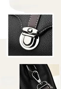 Detail view of premium lychee grain leather handbag with silver hardware swivel hooks