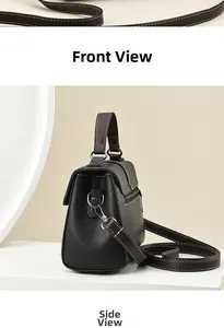 Detailed front and side views of black pebbled leather handbag with brown trim
