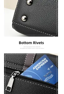 Close-up of black pebble leather handbag featuring silver bottom rivets and zipper card slot
