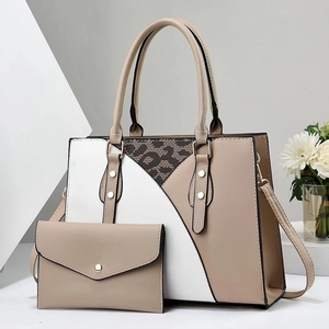 Grande borsa tote bicolore con dettaglio leopardato e pochette coordinata