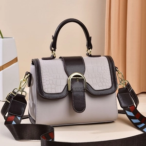 Chic two-tone square crossbody bag with crocodile texture flap and wide striped strap