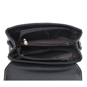 Black pebbled PU leather crossbody bag featuring multiple compartments and contrast stitching