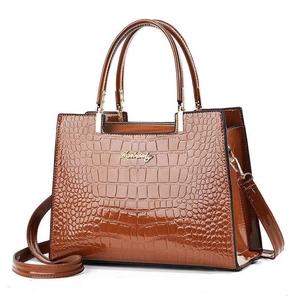 Brown crocodile embossed tote bag with gold logo and detachable shoulder strap