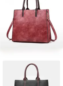 Vertical view of red and black retro faux leather tote bags with polished finish