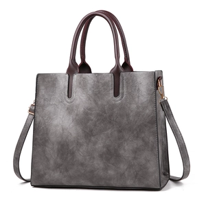 Retro grey marble-textured tote bag with deep wine red handles and crossbody strap