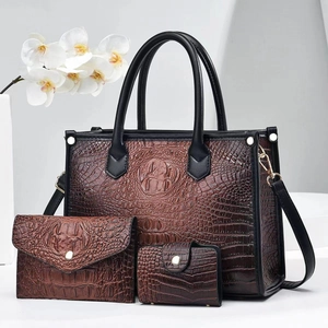 Three-piece brown crocodile embossed tote bag set with wallet and gold hardware details