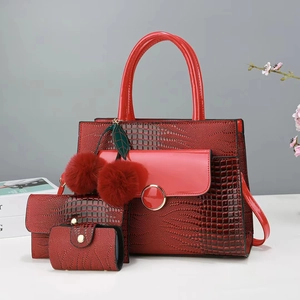 Detailed set of red crocodile pattern tote bag with matching wallet and card holder