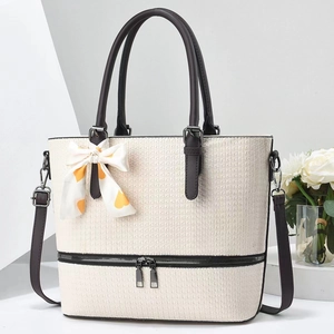 Elegant cream textured tote bag with large capacity and decorative scarf for daily commuting