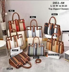 Detail view of woven tote bag series with leather trim and dimensions 33x12x23cm