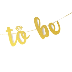 Golden glitter Bride to Be banner with diamond ring icon for bachelorette party decor
