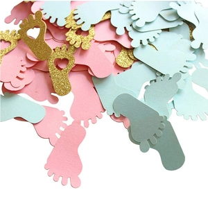 Baby shower footprint confetti in pink blue and gold glitter for gender reveal party decor