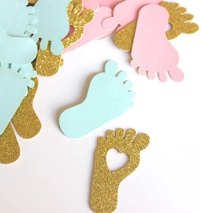 Mix of pink blue and glitter gold baby footprint confetti for gender reveal table decor