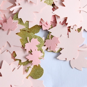 Mix of matte pink and gold glitter maple leaf confetti for Thanksgiving party decor