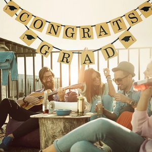 Vintage kraft paper Congrats Grad banner with graduation cap icons for party decor