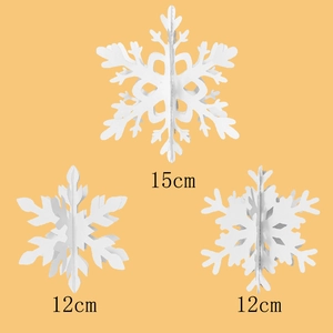 Detail of 3D white hanging snowflakes in 15cm and 12cm sizes for Christmas decor