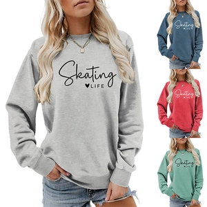 Detail of the Skating Life text and heart print on a grey crewneck sweatshirt