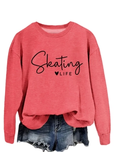 Detail of red Skating Life sweatshirt paired with distressed frayed denim shorts