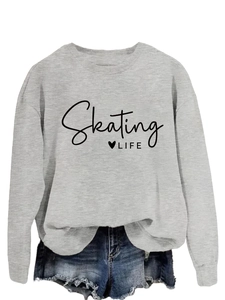 Close-up of Skating LIFE and heart print on grey crewneck sweatshirt fabric detail