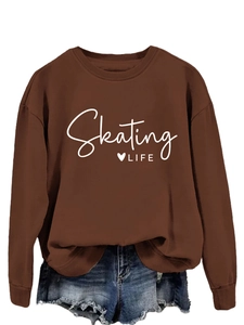Detail of Skating Life heart print on dark brown crewneck sweatshirt for women