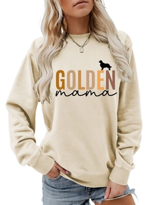 Detail of GOLDEN mama print and golden retriever silhouette on beige sweatshirt