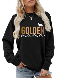 Detail of GOLDEN mama text and golden retriever silhouette on black sweatshirt