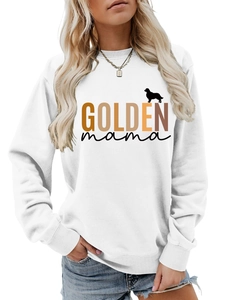 Detail of the Golden Mama print with a golden retriever silhouette on a white sweatshirt