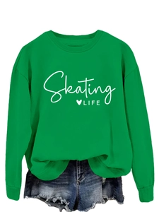 Detail of bright green crewneck sweatshirt featuring white Skating Life heart print