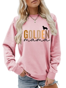 Detail view of the Golden Mama text print and golden retriever silhouette on pink sweatshirt