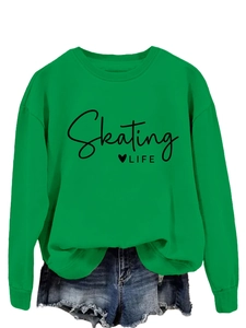 Close-up of ribbed neckline and Skating LIFE print on green crewneck sweatshirt