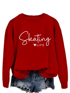 Detail of red crewneck sweatshirt featuring white Skating LIFE print and heart graphic