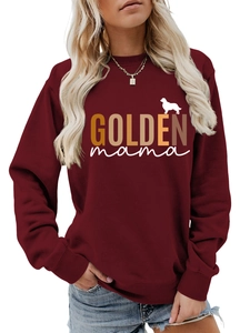 Detail of burgundy sweatshirt with GOLDEN mama text and golden retriever silhouette
