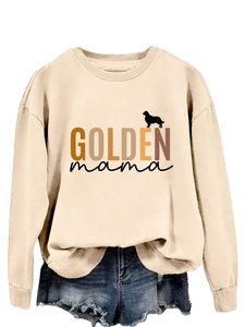 Close-up of Golden Mama golden retriever print on beige long sleeve sweatshirt