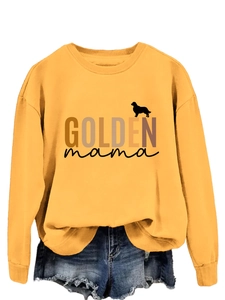 Detail of Golden mama text and golden retriever silhouette on yellow crewneck sweatshirt