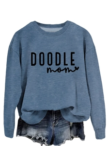 Detailed view of DOODLE mom graphic print on a relaxed gray-blue crewneck sweatshirt