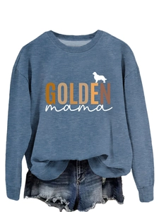 Close-up of Golden Mama print and golden retriever silhouette on blue sweatshirt