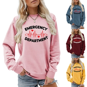 Detail of Emergency Department print with heartbeat heart logo on colorful crewneck shirts