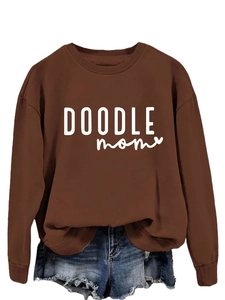 Detail of DOODLE MOM text and heart print on dark brown ribbed collar sweatshirt