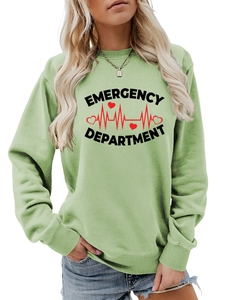 Detail of light green sweatshirt ribbed cuffs and Emergency Department print text