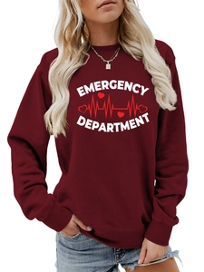 Detail of emergency department print and heart rhythm graphic on burgundy crewneck sweatshirt