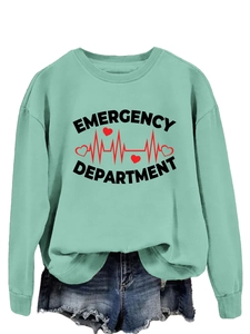 Detail of mint green sweatshirt featuring Emergency Department print and heart rate graphic