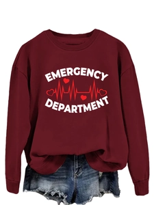 Close-up of Emergency Department graphic print on burgundy crewneck sweatshirt