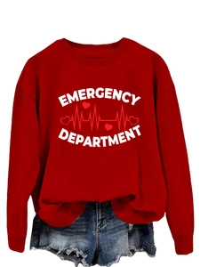 Close-up of Emergency Department print on dark red crewneck sweatshirt with heart pattern