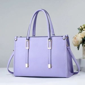 Elegant purple lychee leather tote bag with gold hardware for professional daily commute