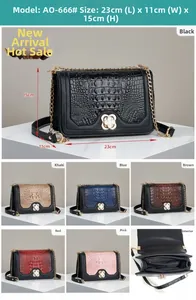 Detail view of crocodile pattern chain bag showing multi-layer interior and dimensions 23x11x15cm