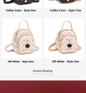 Detail view of mini backpacks in coffee and beige with cat charm and star patterns