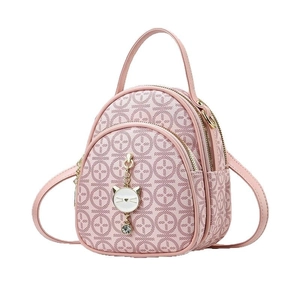 Pink mini faux leather backpack with geometric pattern and white cat pendant